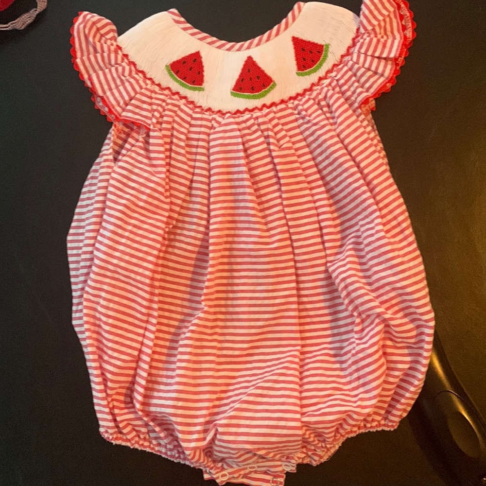 Smock Monkey size 2 onesie.